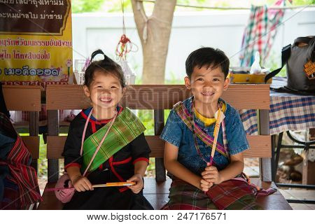 Khao Wong, Kalasin - June 16, 2018: Boy And Girl Dress Up By Culture For Travel At Wat Wang Kham Tem