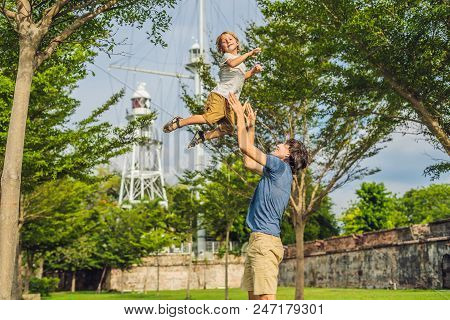 Dad And Son On Background Of Fort Cornwallis In Georgetown, Penang, Is A Star Fort Built By The Brit