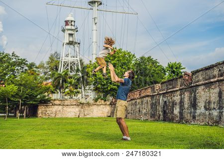 Dad And Son On Background Of Fort Cornwallis In Georgetown, Penang, Is A Star Fort Built By The Brit