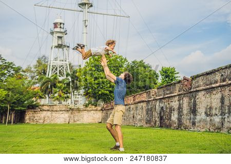 Dad And Son On Background Of Fort Cornwallis In Georgetown, Penang, Is A Star Fort Built By The Brit