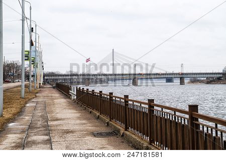 Riga, Latvia - April 01, 2018: View To The Bridge At The Spring Cloudy Day