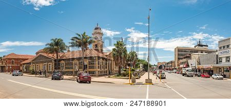 Ladysmith, South Africa - March 21, 2018: A Street Scene, With The Historic Town Hall And Cannons Fr