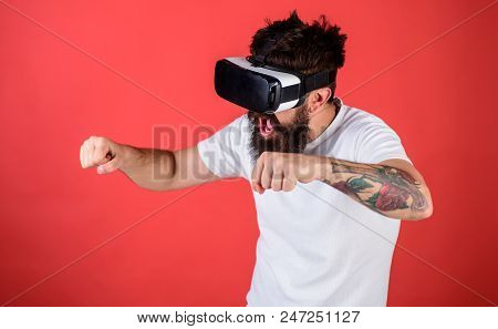 Hipster On Excited Face Driving Bike On High Speed In Virtual Reality With Modern Digital Gadget. Vi