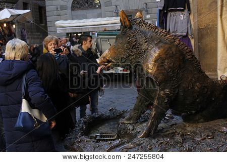 Florence, Italy - November 22 2015: People Around The Porcellino Statue In Florence, That Bring Good