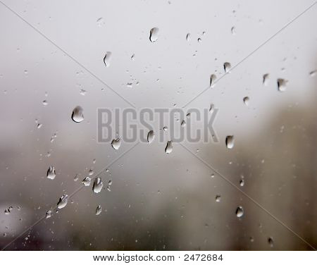 Drops On Glass During Snowstorm