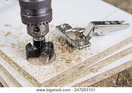 Milling Cutter For Fixing Hinges In Chipboard. Joinery Accessories For Furniture Construction.