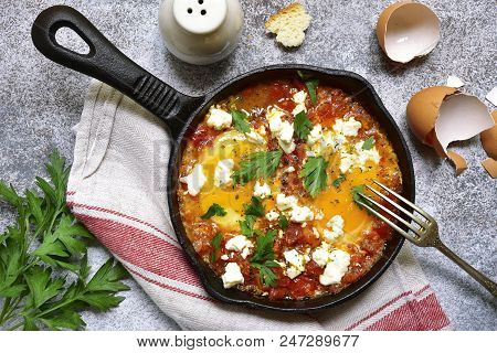 Shakshouka (spicy Tomato Stew With Chicken Eggs) With Feta Cheese - Traditional Dish Of Israeli Cuis