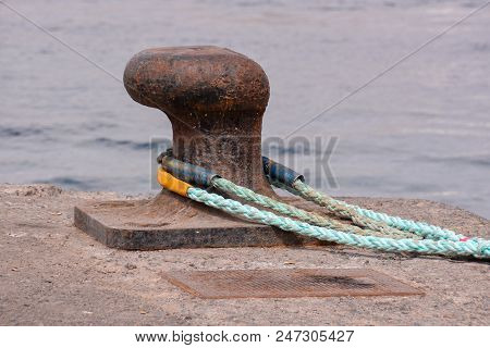 Photo Picture Of A Rusty Metal Mooring Bolard For Big Ship