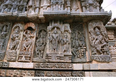 Ornate Bas Relieif And Sculptures Of Hindu Deities, Kedareshwara Temple, Halebid, Karnataka, India.