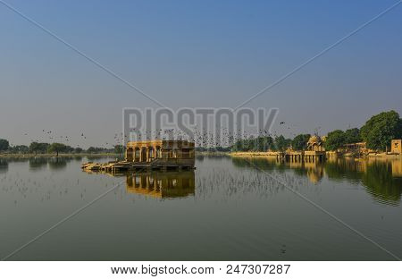 View Of Gadsisar Lake With Ancient Hindu Temples At Sunny Day In Jaisalmer, India.