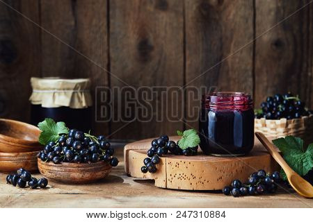 Freshly picked home grown blackcurrants and homemade blackcurrant jam