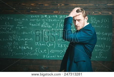 Unproven Theorem. Man Formal Wear Classic Suit Looks Smart, Chalkboard Background. Genius Suffers Un