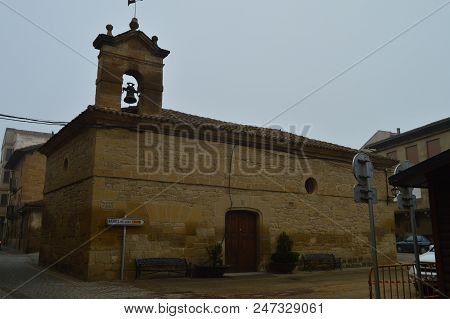 Main Facade Of The Hermitage Of San Roque On A Very Cloudy Day In San Vicente De La Sonsierra. Archi