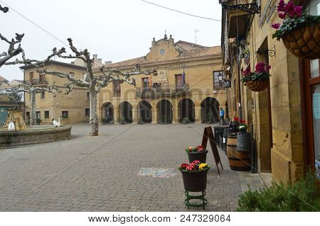 Main Facade Of The Town Hall In The Plaza Mayor On A Very Cloudy Day In San Vicente De La Sonsierra.