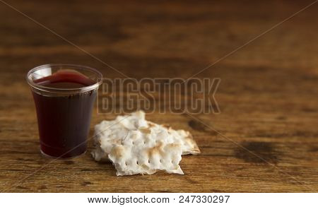 Simple Christian Communion On A Wooden Table
