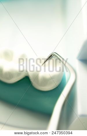 Dentist Cleaning Teeth