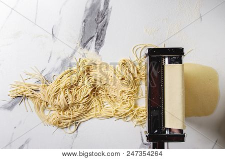 Rolled Dough For Homemade Italian Uncooked Pasta Spaghetti From Pasta Machine Maker With Semolina Fl