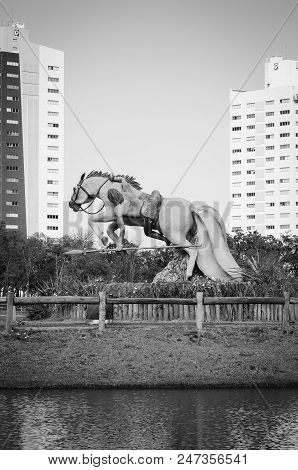 Campo Grande, Brazil - June 26, 2018: Monument Of A Indigenous Warrior Riding His Horse And Attackin