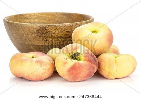 Fresh Ripe Saturn Peaches Near Wooden Bowl Isolated On White Background