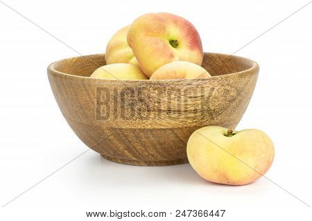 Fresh Ripe Saturn Peaches In Wooden Bowl And One Peach Is Near Isolated On White Background