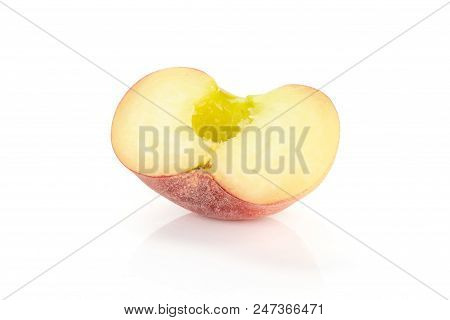 One Fresh Ripe Saturn Peach Half Without A Drupe Isolated On White Background