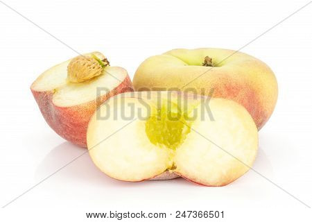 One Fresh Ripe Saturn Peach And Two Halves Isolated On White Background
