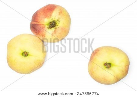 Three Fresh Ripe Saturn Peaches Top View Isolated On White Background