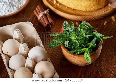 Fresh Mint Leaves In A Bowl On Wooden Table, Close-up, Selective Focus, Shallow Depth Of Field. Mint