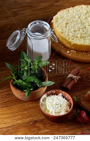 Fresh Mint Leaves In A Bowl On Wooden Table, Close-up, Selective Focus, Shallow Depth Of Field. Mint