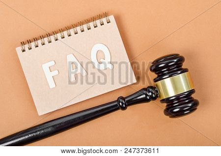 Frequently Asked Questions With Judge Hammer. Faq Law Concept.
