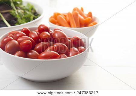 Healthy Fixings For A Beauitful Salad On A White Table