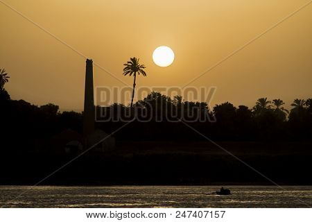 River Bank Silhouette At Dusk Sunset