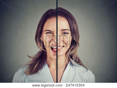 Bipolar Disorder Concept. Young Woman With Double Face Expression Isolated On Gray Background