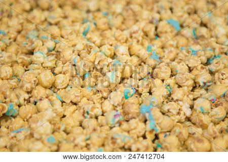 Caramel Popcorn With Blue Drizzle And Sprinkles