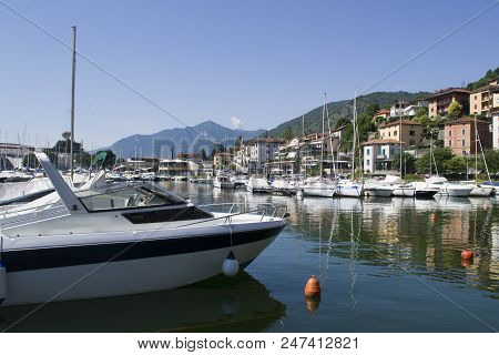 Lake Waith Boats On The Water. Beautiful Landscape In Italy With Boats On The Water.