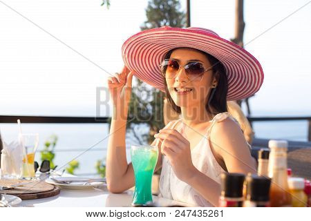 Beautiful Asian Woman Drink Sada In Reataurant, Woman Lifestyle Concept.