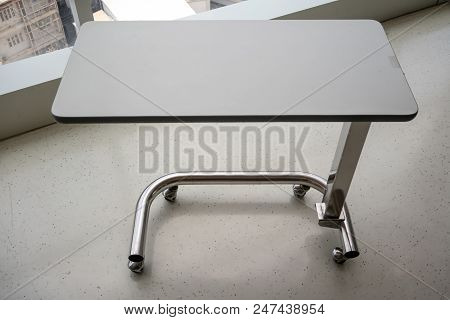 Lightweight Portable Medical Table For Tools. Overbed Table In The Hospital