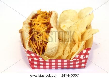 Hot Dog with Chili con carnie and cheese. Isolated on white. Room for text. Chili Dog. Chili Cheese Hotdog. 