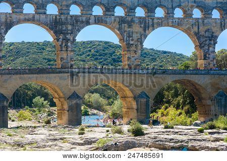 Remoulins,france-august 12, 2016: People Pont Du Gard Roman Aqueduct