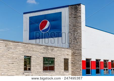 Ft. Wayne - Circa June 2018: Pepsi Bottling Signage. Pepsi Is One Of The Largest Beverage Producers 