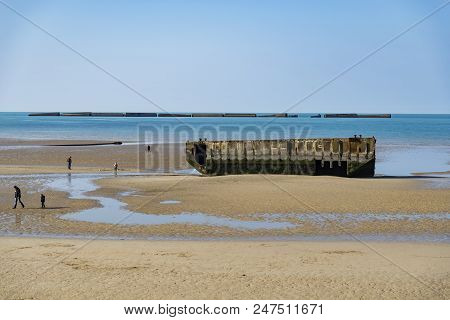 Arromanches - April 6: The Remains Of The Mulberry From Wwii D-day Harbor On April 6, 2016 In Arroma