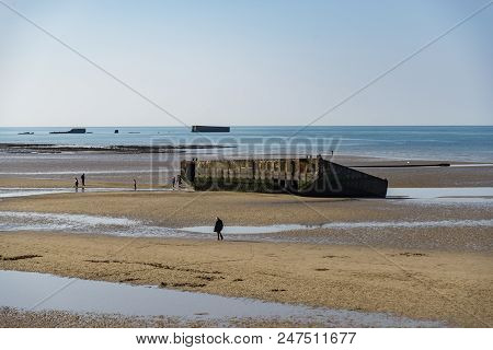 Arromanches - April 6: The Remains Of The Mulberry From Wwii D-day Harbor On April 6, 2016 In Arroma