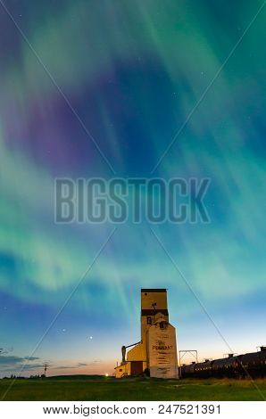 Aurora Borealis Over A Historic Grain Elevator In Pennant, Saskatchewan, Canada