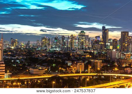 Cityscape And Light Of Night Road In Long Exposure