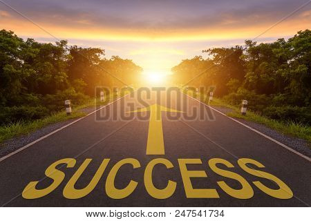Empty Blur Asphalt Road And Sunlight And Sign Which Symbol Success. Concept For Success.