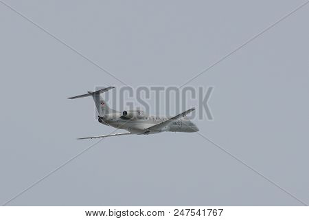 Passenger Airplane Flying In The Sky