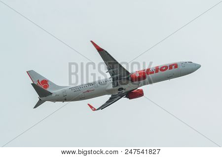 Passenger Airplane Flying In The Sky