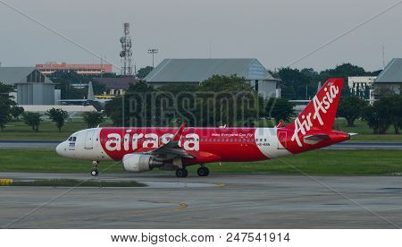Bangkok, Thailand - Apr 23, 2018. An Airbus A320 Airplane Of Airasia Taxiing On Runway Of Don Muang 