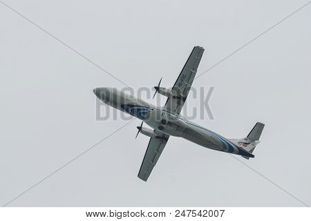 Passenger Airplane Flying In The Sky