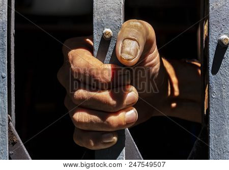 Rough Hands Holding The Iron Cage, A Concept About The Detention And Stress.
